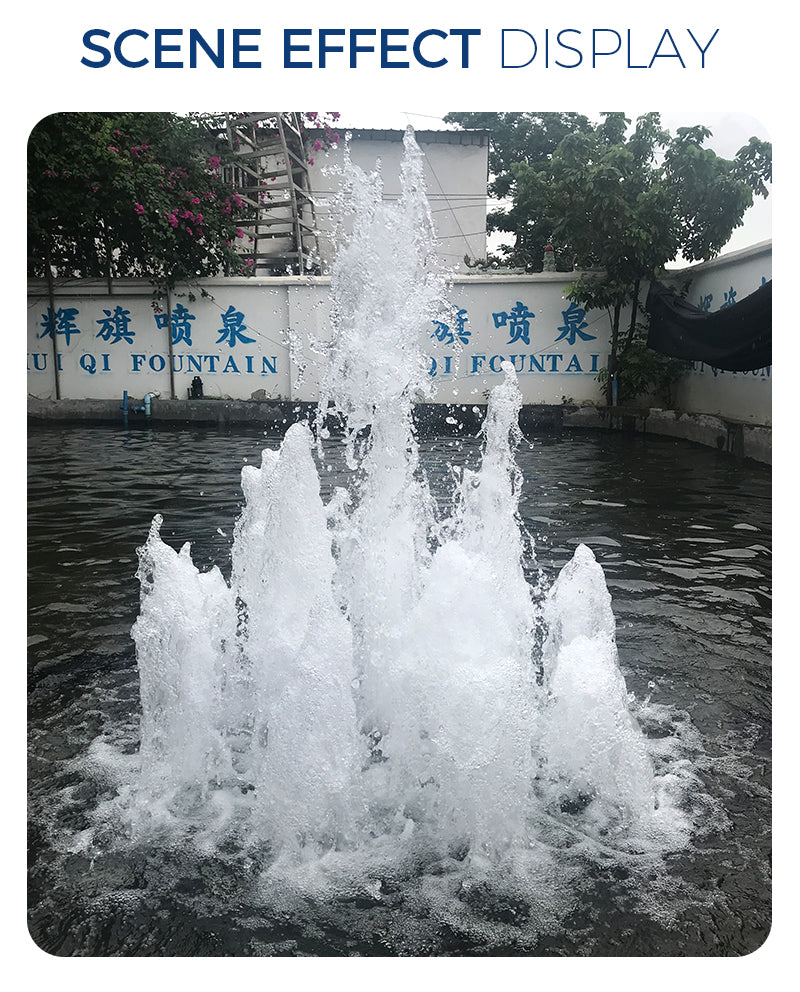 Fountain with water spraying high into the air in front of a building
