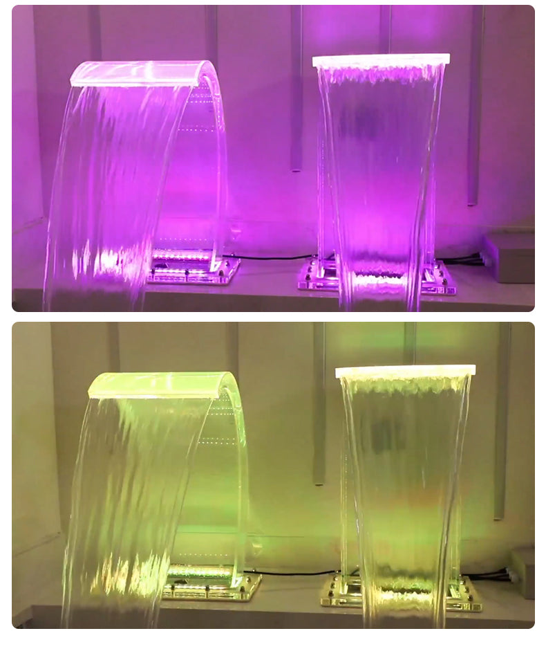 Two LED water fountains in purple and green light on a white background.
