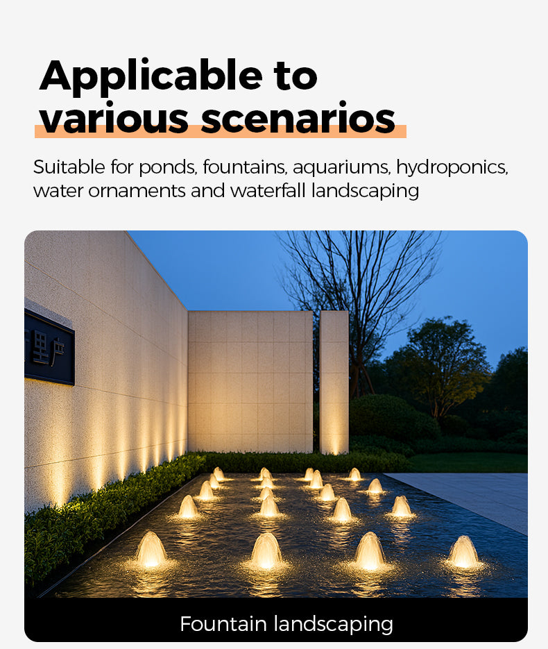 Fountain landscape with illuminated water features in a modern architectural setting
