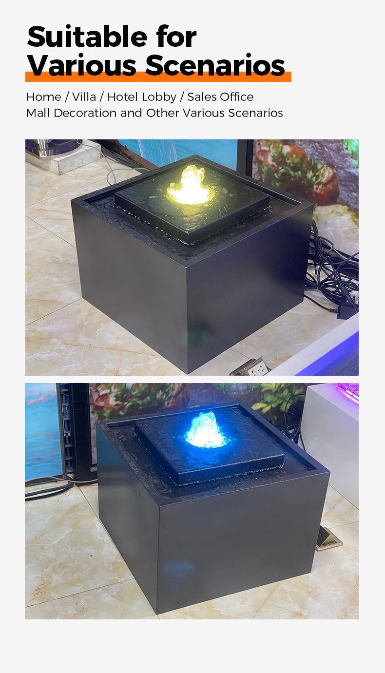 Black cube-shaped water fountain with glowing interior on a tiled floor, suitable for various scenarios.